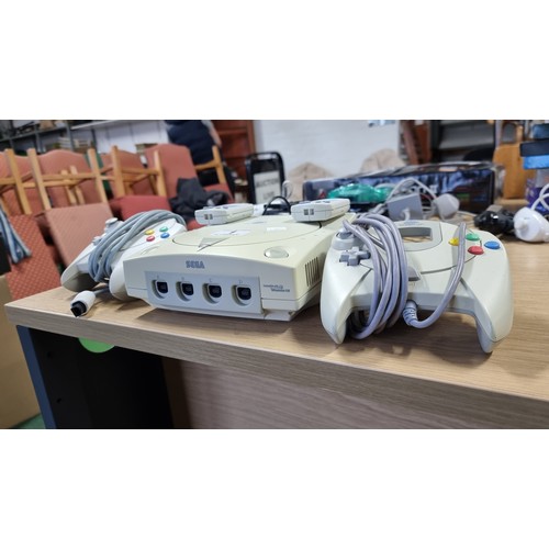 1 - Vintage Sega Dreamcast gaming console complete with 2x controllers all the cables and 11x various ga... 