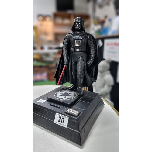 20 - Batman alarm clock with a projector light in working condition along with a Star Wars interactive sa... 