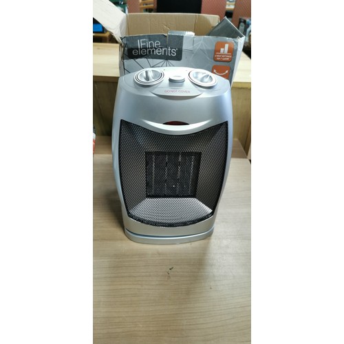 146 - Boxed 1500w oscillating fan heater plus a double hot plate Kitchen Perfected both items new in boxes