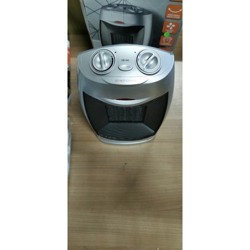 146 - Boxed 1500w oscillating fan heater plus a double hot plate Kitchen Perfected both items new in boxes