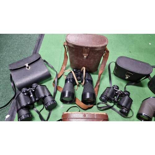 68 - Joblot of 8x pairs of vintage binoculars to include a good quality military set of binoculars 7x50 m... 