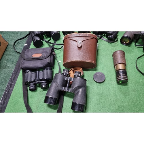 68 - Joblot of 8x pairs of vintage binoculars to include a good quality military set of binoculars 7x50 m... 