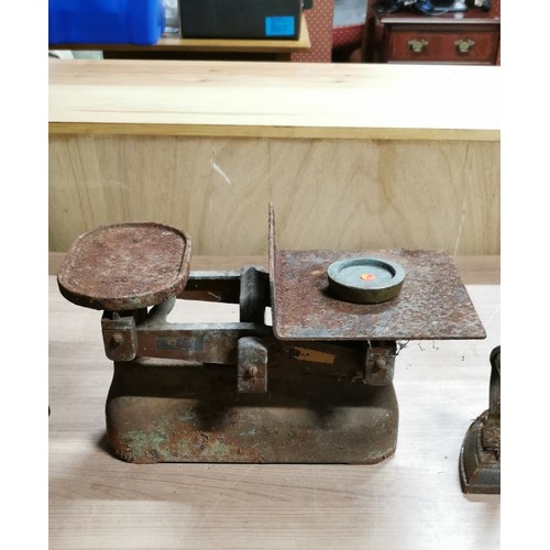 177 - Antique GPO weighing scales with Salter flat irons and a shoe last.