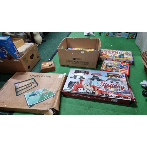 79 - Box of board games inc an all in one multi game a holiday express train set etc