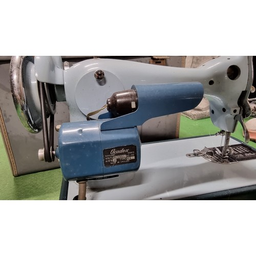 85 - Vintage Jones model D68 deluxe sewing machine in baby blue in excellent condition complete