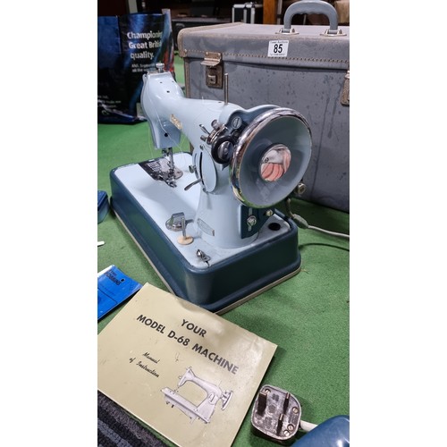 85 - Vintage Jones model D68 deluxe sewing machine in baby blue in excellent condition complete