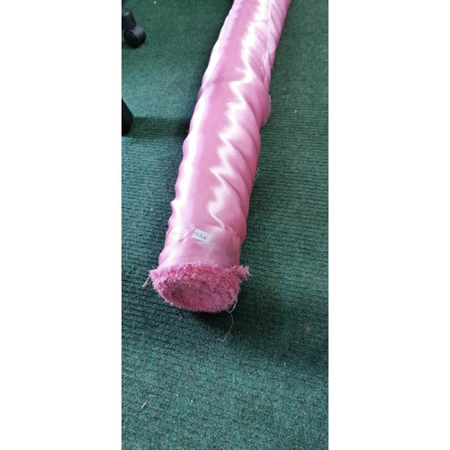 194 - Roll of Shiny bright pink material, width measures 148cm.