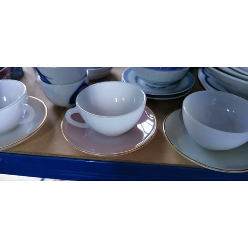 197 - Large quantity of excellent quality blue and white China in various designs along with a set of Opal... 