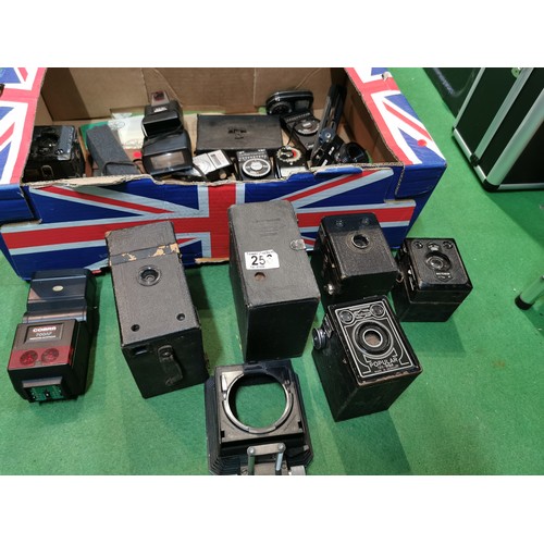 256 - A quantity of boxed cameras and flashes etc inc Photopia popular 120, Goerz frontar, Brownie etc