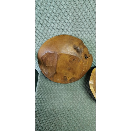 202 - 2x fruit wooden bowls in a good natural form. Measures 7.5cm height x width 30cm.