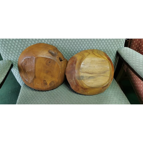 202 - 2x fruit wooden bowls in a good natural form. Measures 7.5cm height x width 30cm.