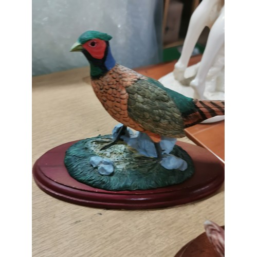 269 - A collection of 7 ceramic figurines inc king fisher, pheasant, barn owls, by the Leonardo collection... 