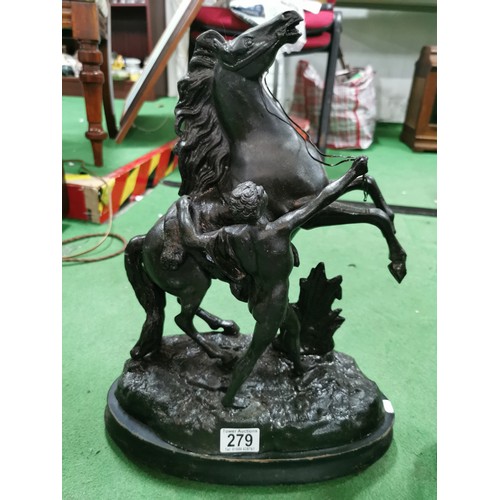 279 - A pair of spelter marley horses in overall good condition standing on wooden bases both are signed h... 