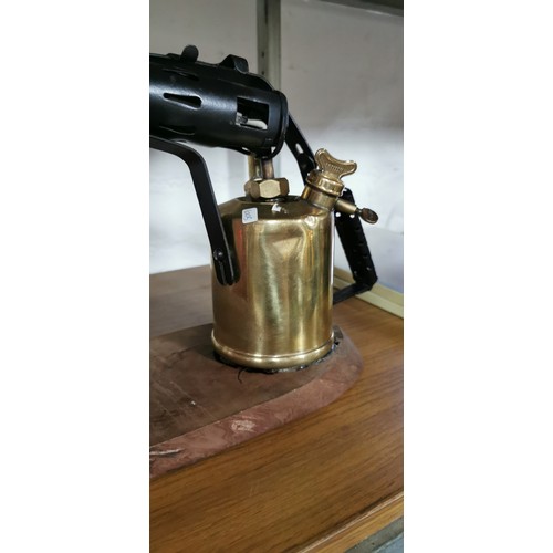 219 - Converted brass blow lamp / blow torch into a lamp attached to a wooden base along with vintage orig... 