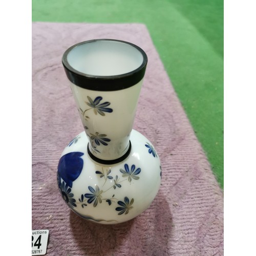 284 - A pair of milk glass hand painting vases with floral design with signature to the base in excellent ... 