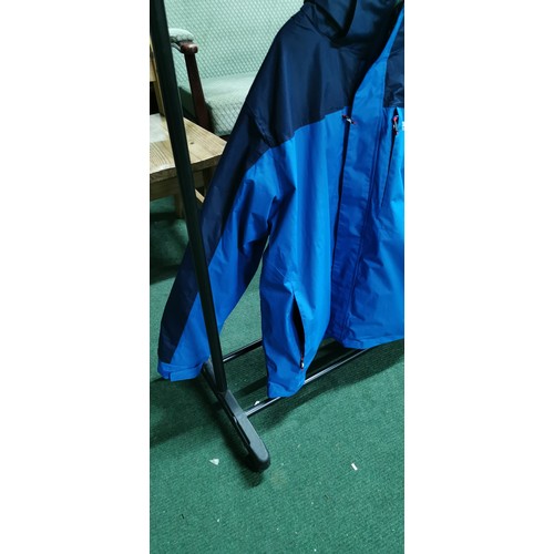 234 - Trespass two tone blue waterproof coat with fleece in the liner in excellent appears in unused condi... 