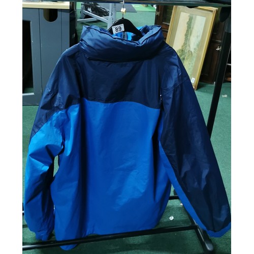 234 - Trespass two tone blue waterproof coat with fleece in the liner in excellent appears in unused condi... 