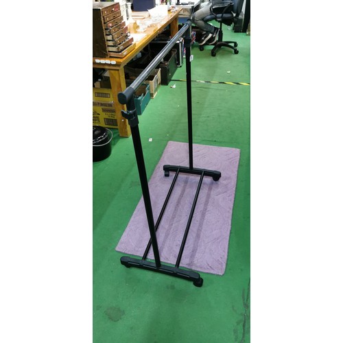 235 - black and chrome collapsible clothes rail, height is adjustable on casters. Height when not extended... 