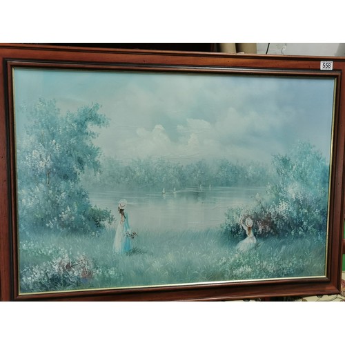 558 - Large, framed oil on canvas of a lake scene signed lower left. Height of 73cm x length 102cm x