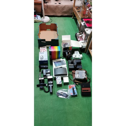 257A - box of various vintage cameras and camera accessories including 2 boxed polaroid cameras