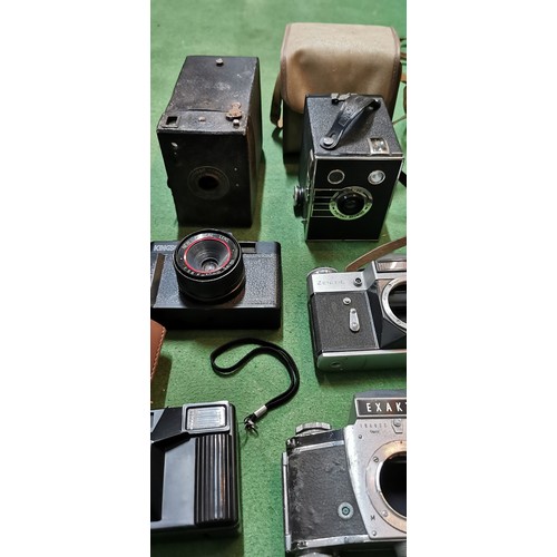 257B - box of various vintage cameras and camera accessories  inc zenit 35mm cameras etc.