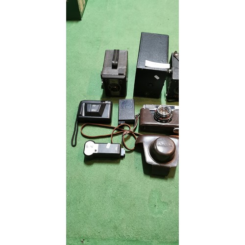 257B - box of various vintage cameras and camera accessories  inc zenit 35mm cameras etc.