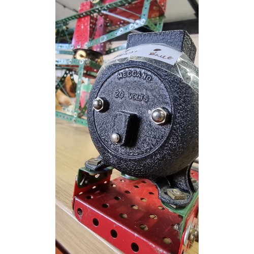 2 - Vintage assembled Meccano structure along with a vintage Meccano 20 volt motor and 1x other geared p... 