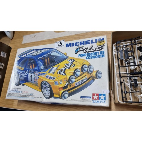 25 - Vintage Tamiya Michelin Pilot Ford Escort RS Cosworth model car kit, unassembled and complete.