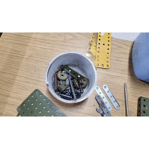28 - 2x boxes of various Meccano parts inc Meccano wheels, tools, tracks etc along with a boxed Lego trai... 