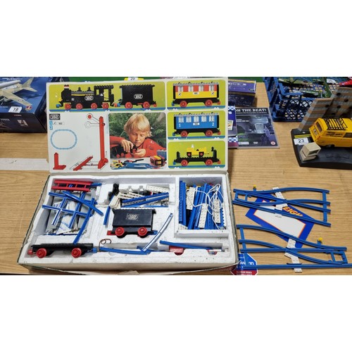 28 - 2x boxes of various Meccano parts inc Meccano wheels, tools, tracks etc along with a boxed Lego trai... 