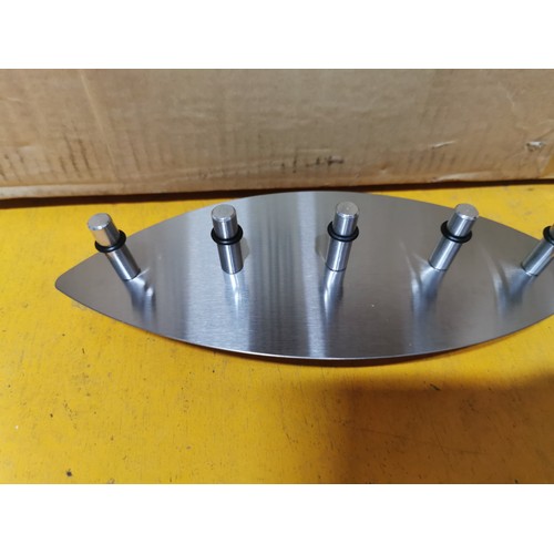 239 - A box containing a large quantity of new and sealed oval hangers. One has been removed from packagin... 