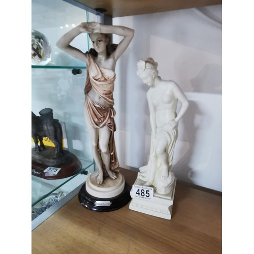 485 - Pair of resin female figures, one on a plinth.
Tallest measures 36cm high.