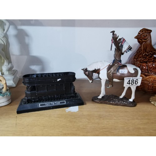 486 - An open top tram made of coal along with a metal horse figure with Indian titled 