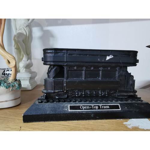 486 - An open top tram made of coal along with a metal horse figure with Indian titled 