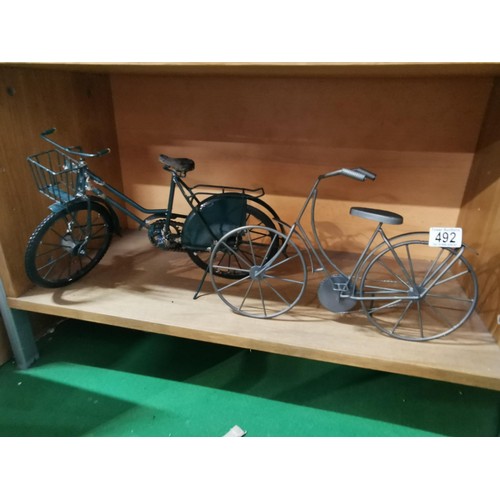 492 - Two large bike formed ornaments, one in the form of a vintage road bike complete with basket.
Talles... 