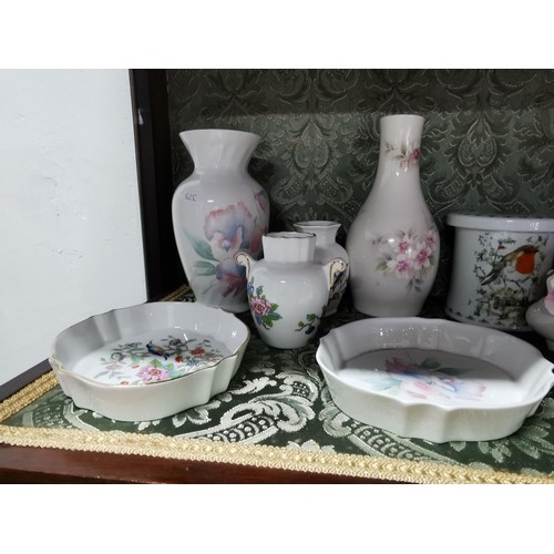 495 - A quantity of collectable china including vases, pin dishes, lidded pots etc. By Aynsley Leonardo co... 