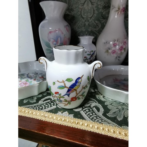 495 - A quantity of collectable china including vases, pin dishes, lidded pots etc. By Aynsley Leonardo co... 