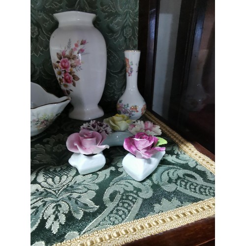495 - A quantity of collectable china including vases, pin dishes, lidded pots etc. By Aynsley Leonardo co... 