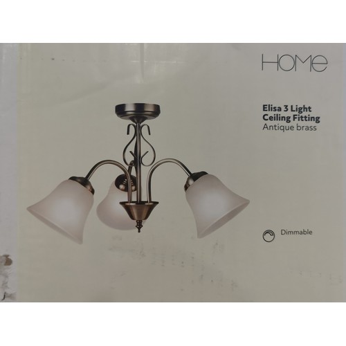 248 - A boxed home elisa 3 light ceiling fitting, along with a table light and spare shade.