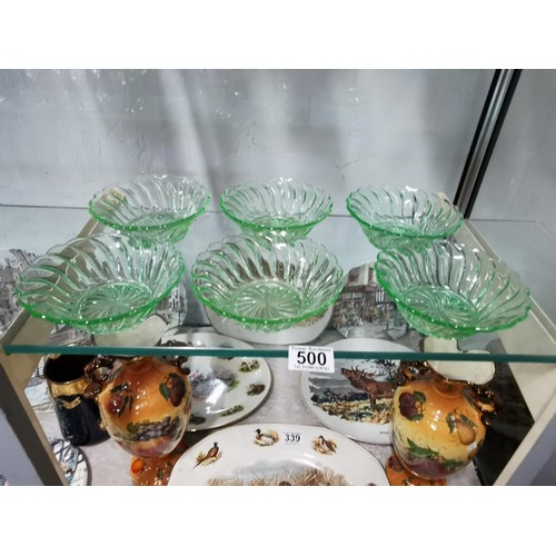 500 - A quantity of six dessert dishes with spiral design, uranium glass. Height 5cm Diameter 13cm.