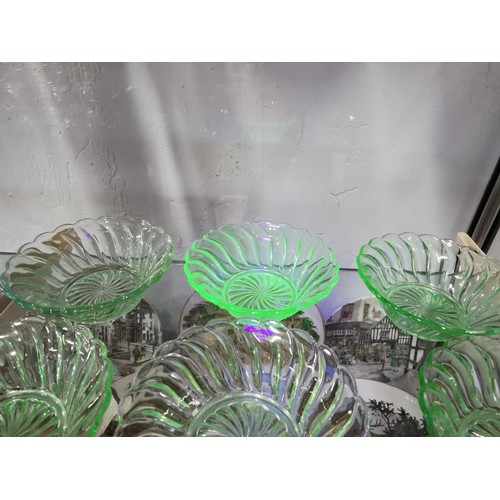 500 - A quantity of six dessert dishes with spiral design, uranium glass. Height 5cm Diameter 13cm.