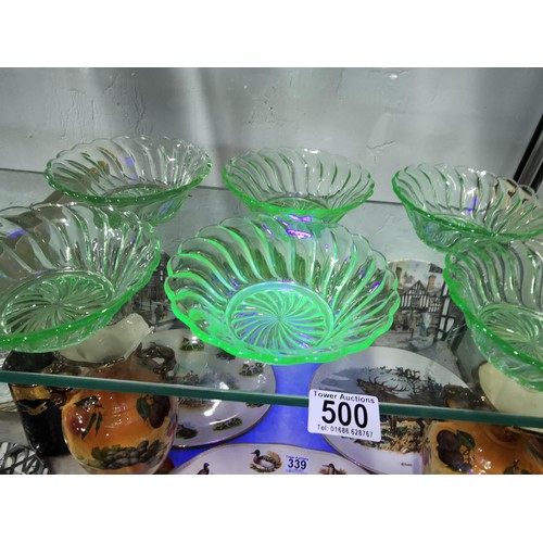 500 - A quantity of six dessert dishes with spiral design, uranium glass. Height 5cm Diameter 13cm.