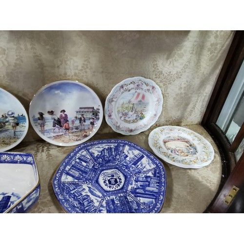 504 - A quantity of limited edition plates depicting the seaside and brambly hedge collection and Ringtons... 
