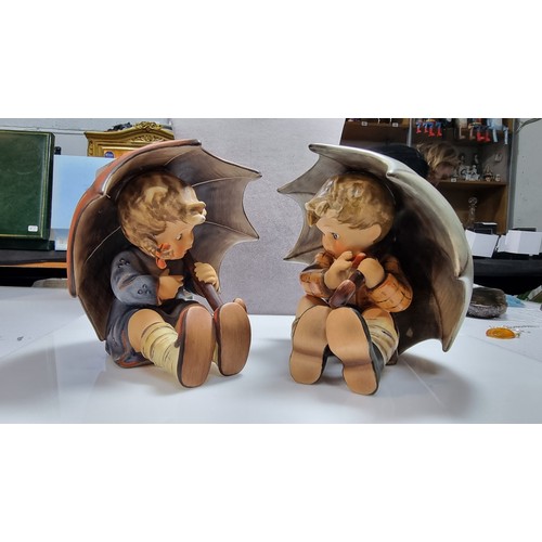 493 - Pair of rare matching Goebel Hummel Boy and Girl under umbrella figures 152/0A & 152/0B both dated 1... 
