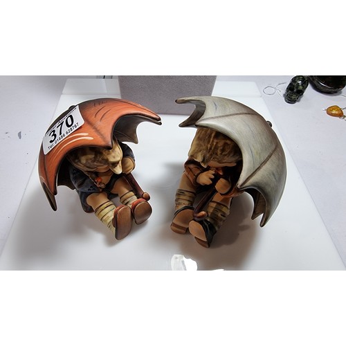 493 - Pair of rare matching Goebel Hummel Boy and Girl under umbrella figures 152/0A & 152/0B both dated 1... 