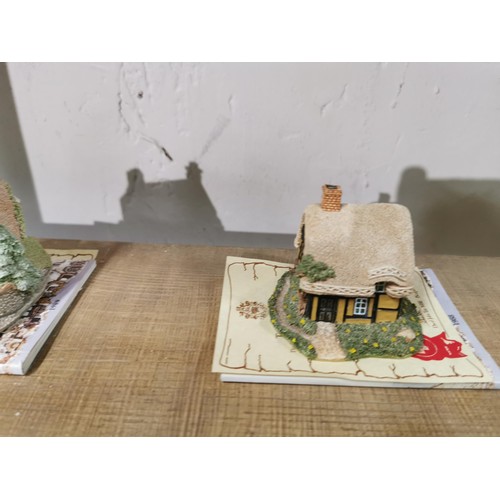 506 - A quantity of eight lilliput lane cottages including Mrs Pinkertons post office, oak cottage, Kentis... 
