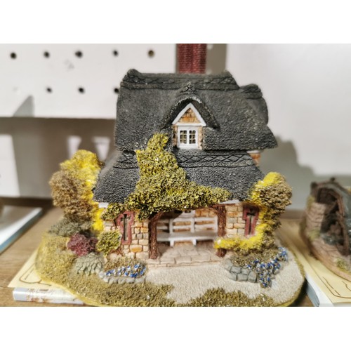 506 - A quantity of eight lilliput lane cottages including Mrs Pinkertons post office, oak cottage, Kentis... 