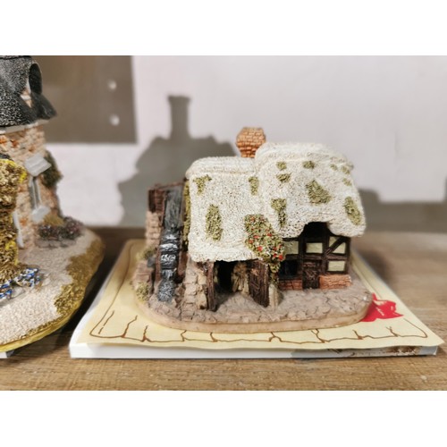 506 - A quantity of eight lilliput lane cottages including Mrs Pinkertons post office, oak cottage, Kentis... 