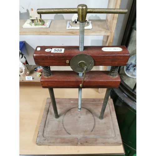 508 - A vintage mahogany cheese press in working order.
Height 47cm Length 40cm Depth 26cm.
