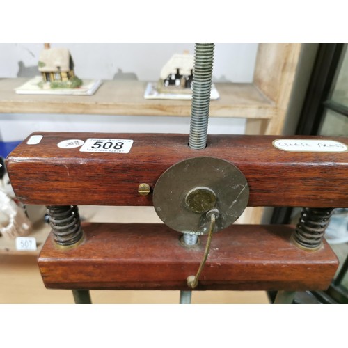 508 - A vintage mahogany cheese press in working order.
Height 47cm Length 40cm Depth 26cm.